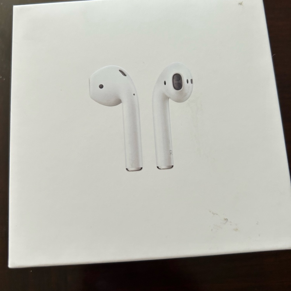Apple AirPods 2 generation with wireless charging case